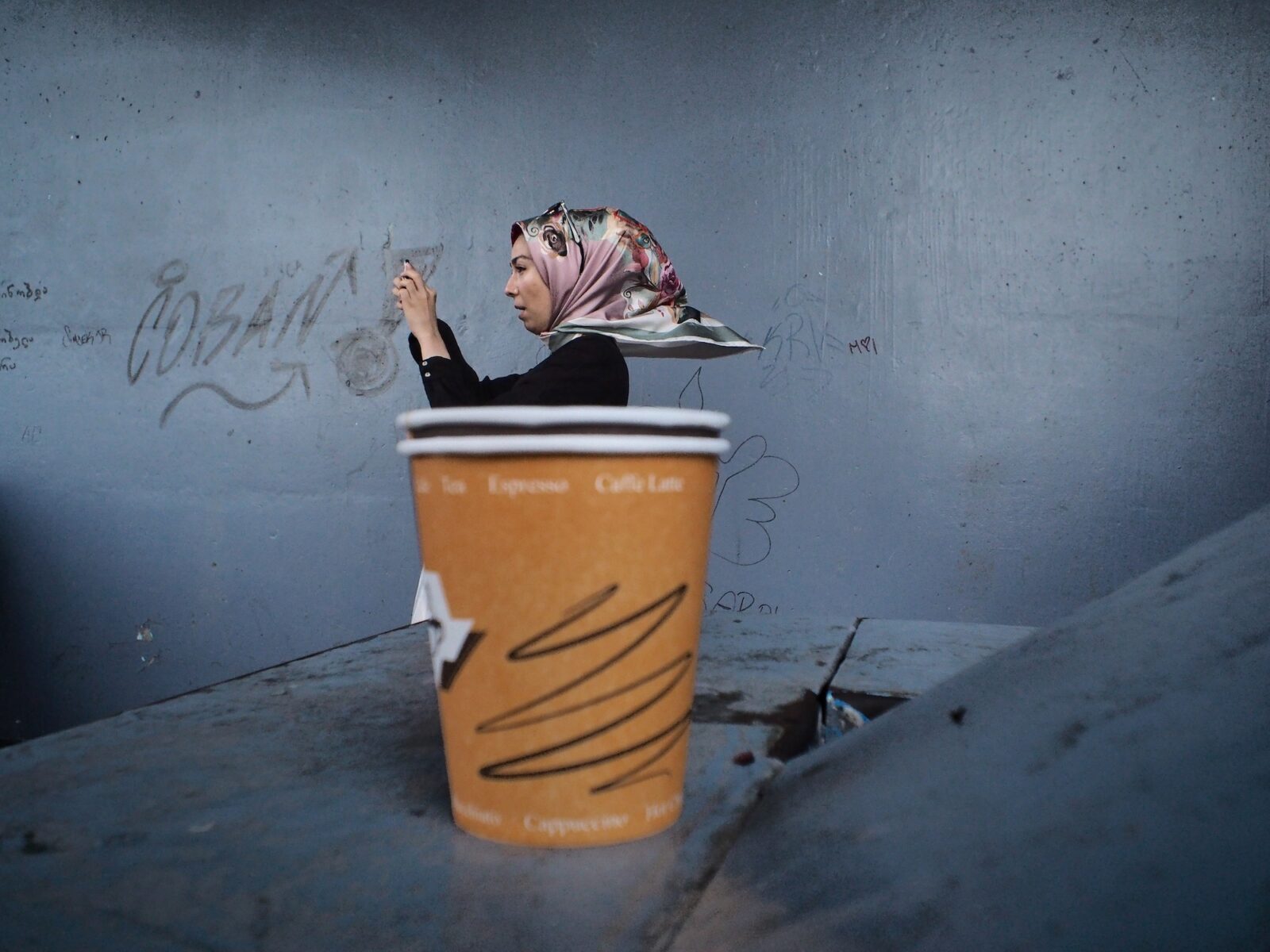 color street photo of woman in Istanbul, Turkey by Gokhan Arer