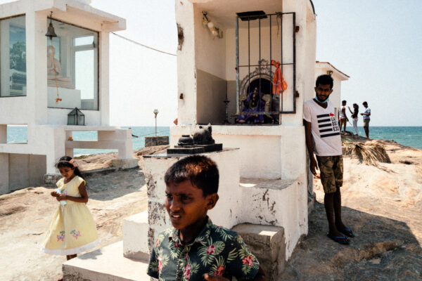 color street photo of kids in Mount Lavinia, Sri Lanka by Jonathan Jasberg