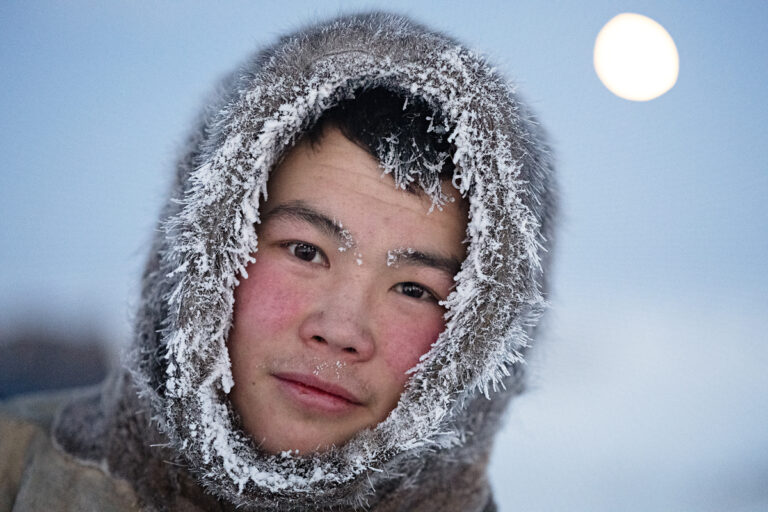 Color documentary photography by Nicola Ducati, portrait of young Nenets man, Siberia