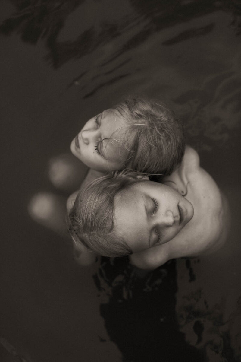 black and white portrait photo of two children by Renee Johnstone