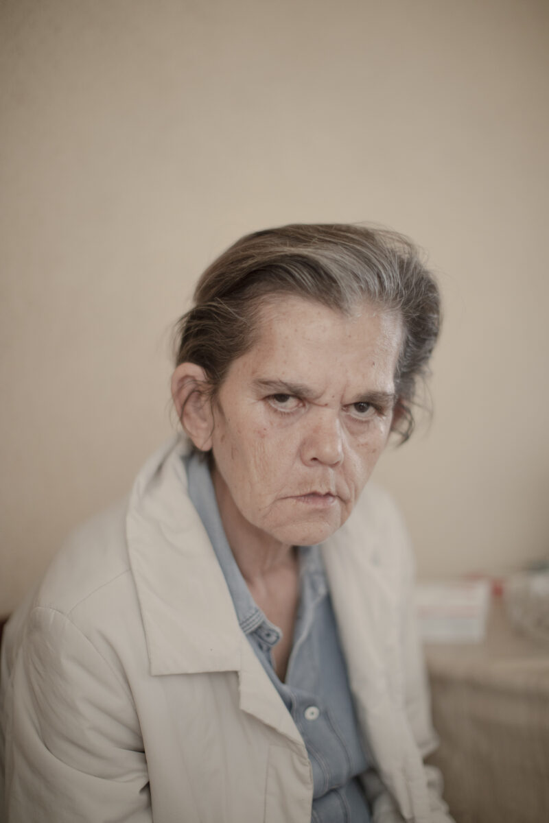 color portrait of an old woman by Ana Hop