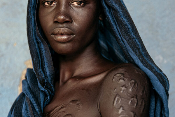 color portrait of a woman from Bodi tribe in Ethiopia by Biljana Jurukovski