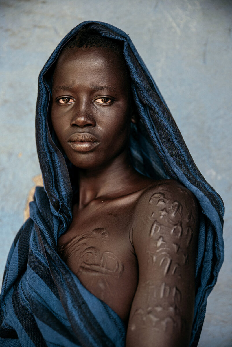 color portrait of a woman from Bodi tribe in Ethiopia by Biljana Jurukovski