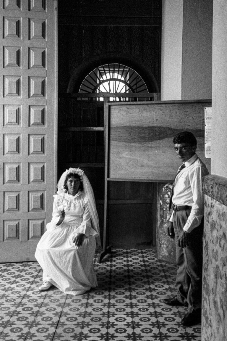 black and white documentary photography by Flavio Cannalonga, girl in wedding dress, Brazil