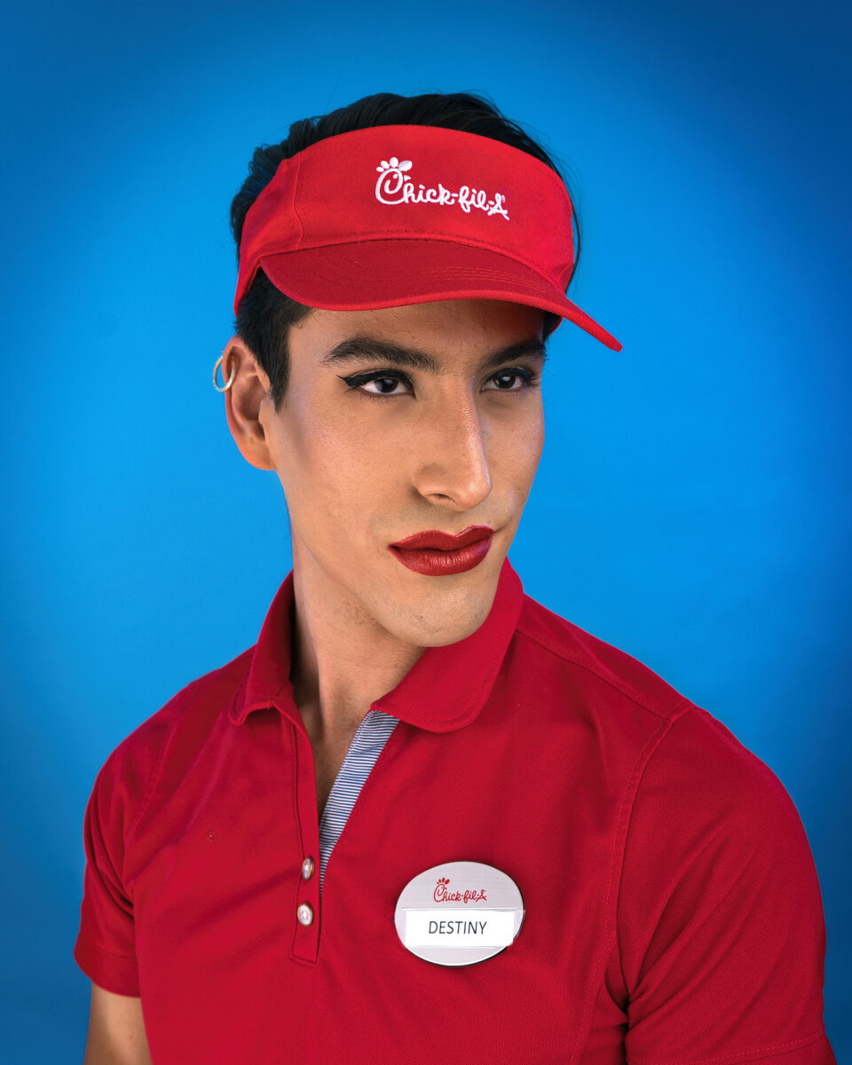 color studio fashion portrait of man with red lipstick by Jason Ward