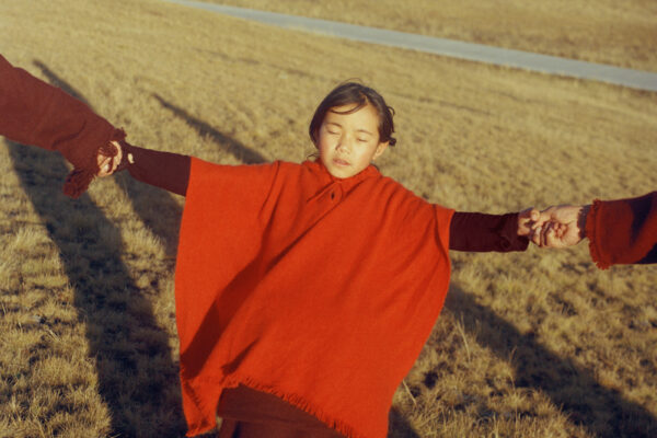 color portrait photo of a young Tibetan girl by Kin Chan