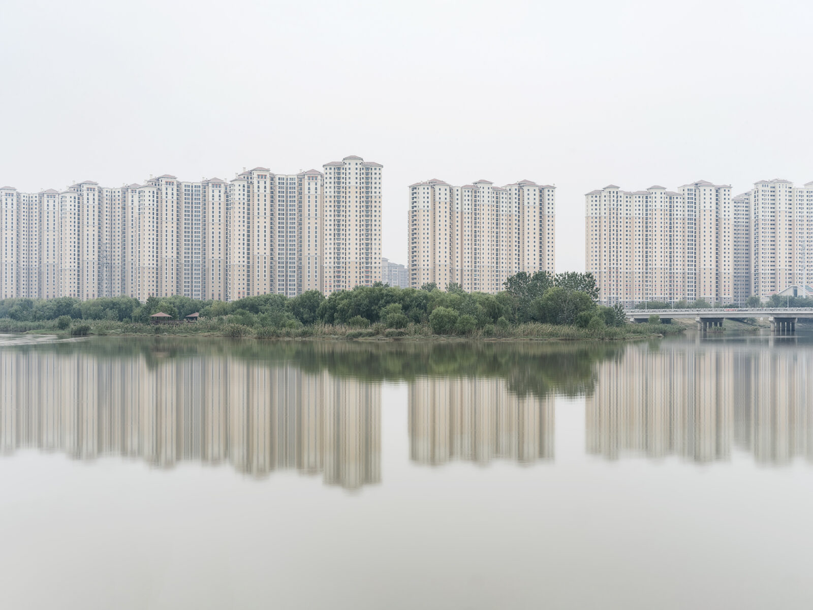 color landscape photo of a cluster of tenement houses on the outskirts of Nanjing, China by Alessandro Zanoni