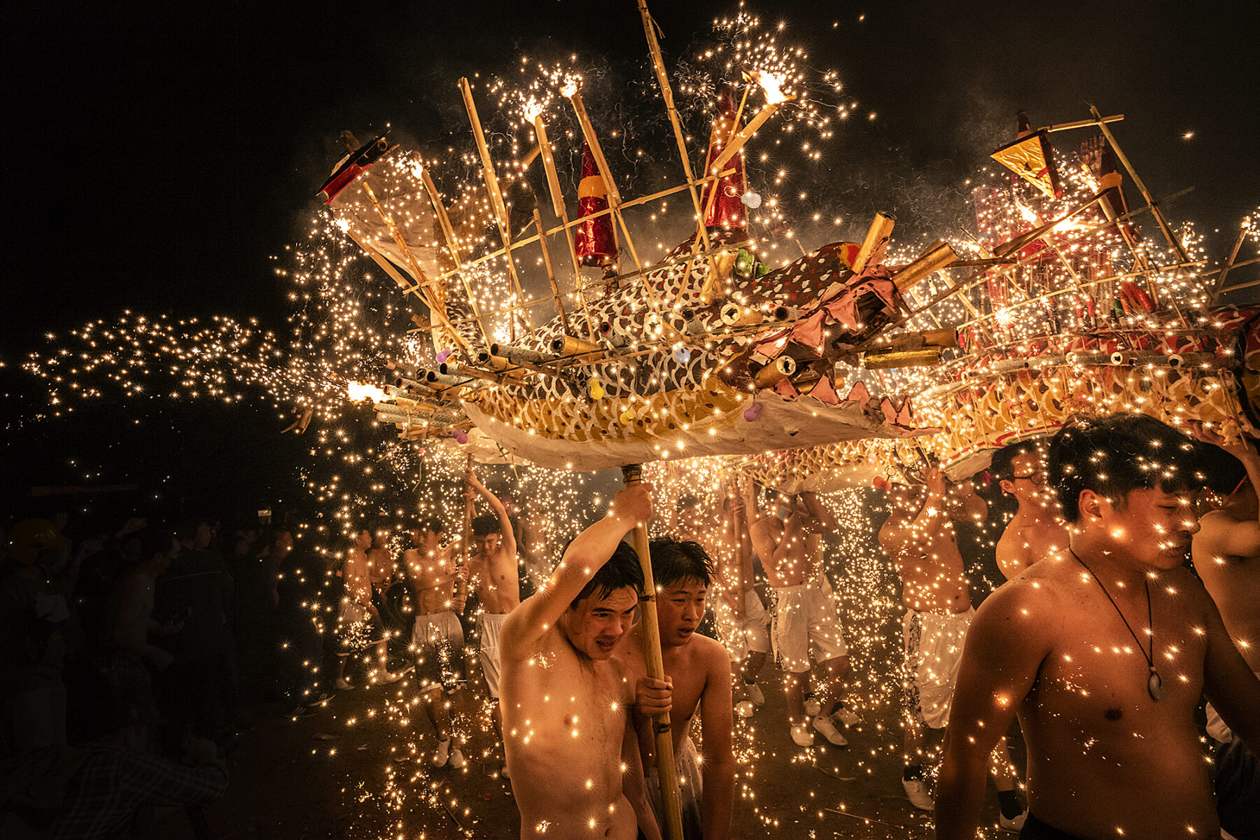 color photo of Fire dragon dance in Meizhou, China by Leo Kwok