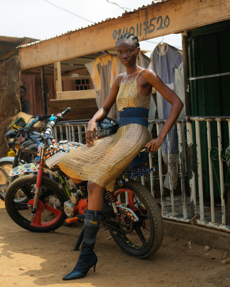 color fashion portrait of a female model on motorcycle in Ghana by Fiifi Abban