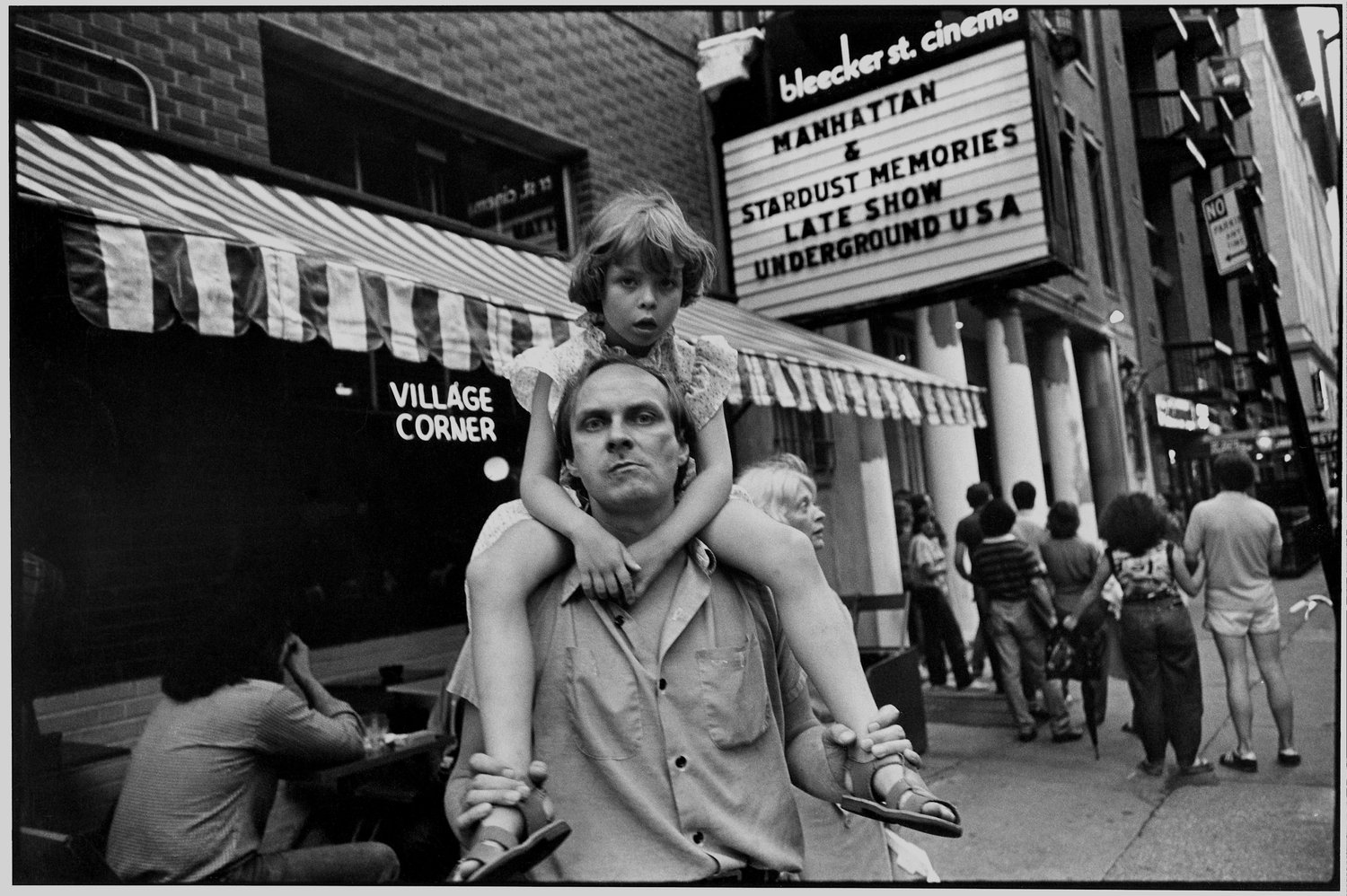 Black & white street photography by Richard Sandler, boy and man, NYC