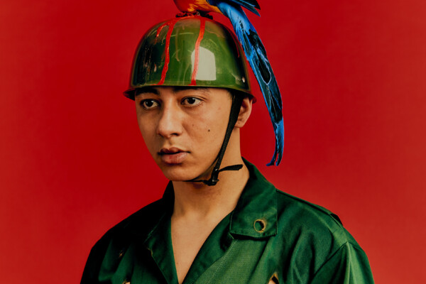 color fashion studio portrait of a male model wearing military clothes by Victoria Ruiz