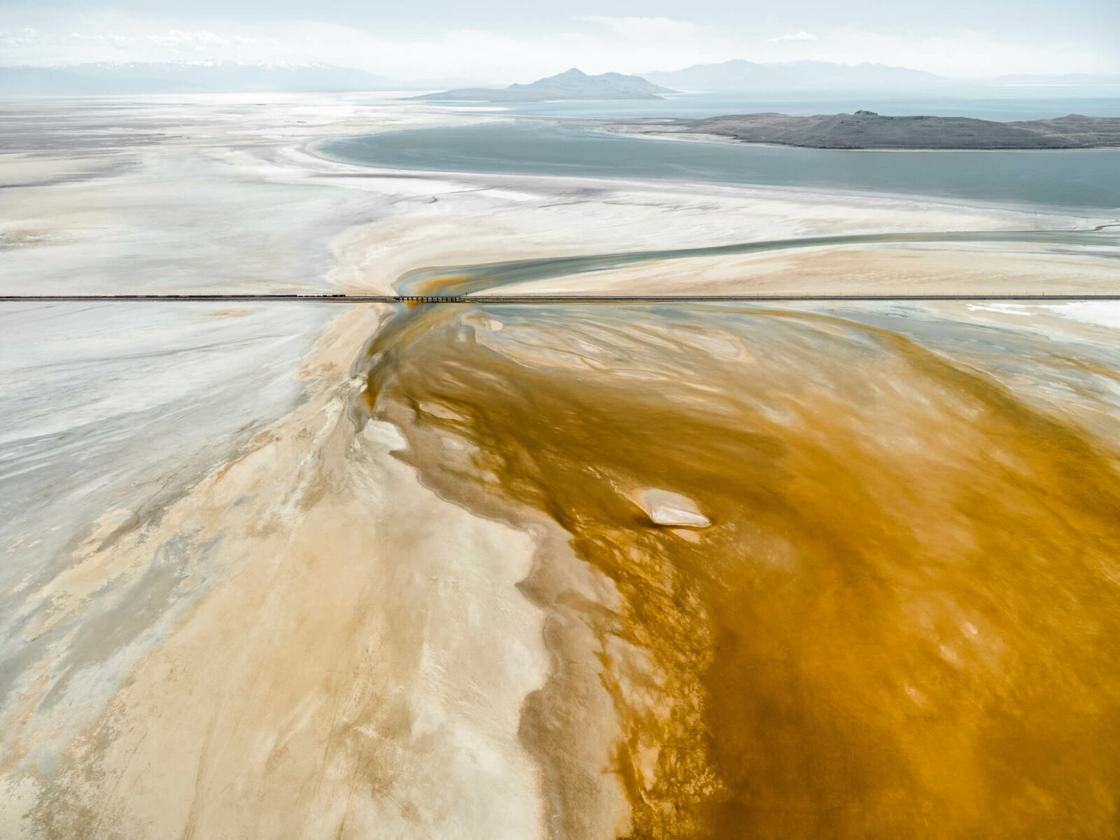 Aerial landscape photography by Tom Hegen of colorful salt pools. From the book Salt Works.