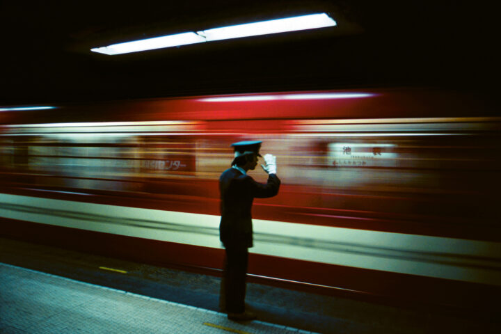 Photography by greg Girard, platform conductor, Tokyo metro. 1976