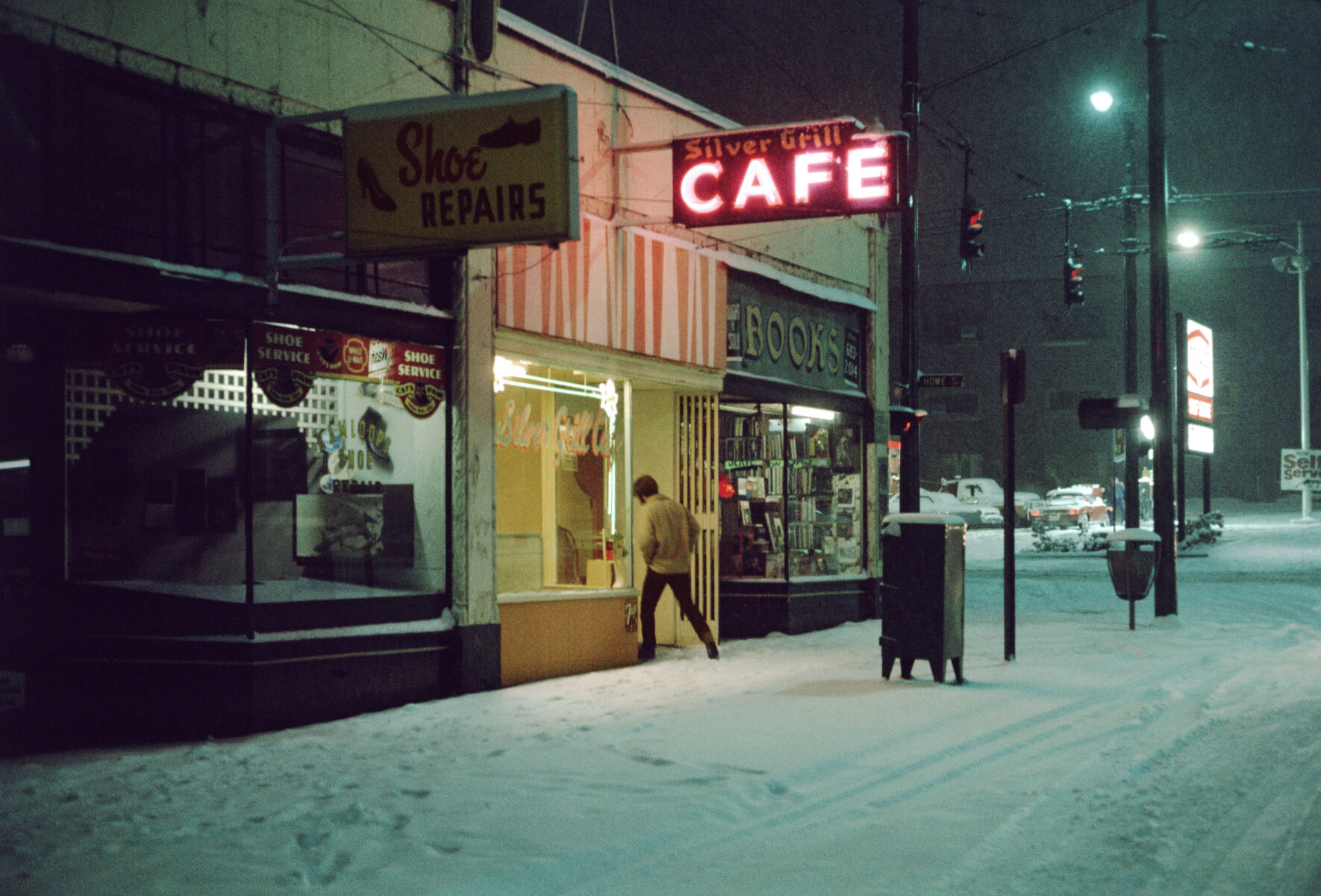 Color photography by Greg Girard, cafe, Vancouver, snow, 1975