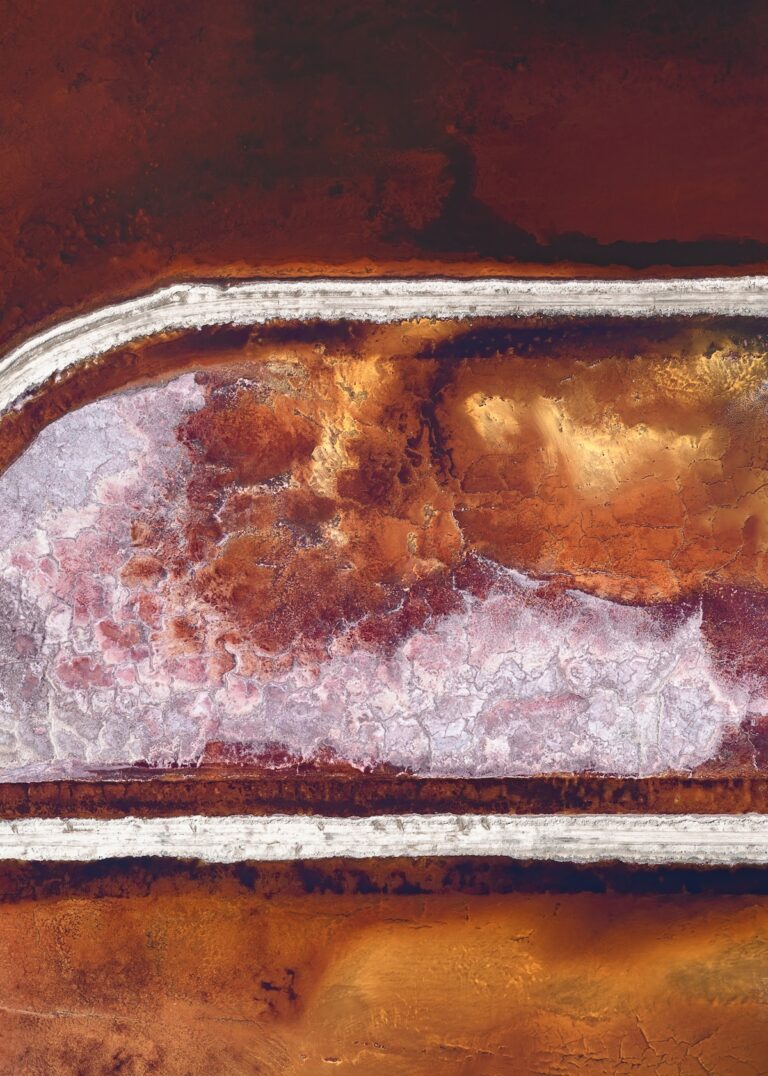 Aerial landscape photography by Tom Hegen of colorful salt pools. From the book Salt Works.