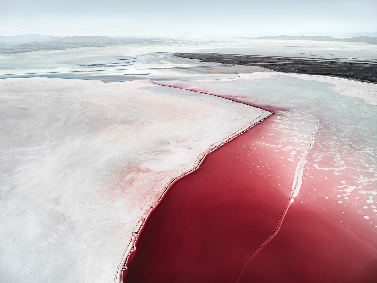 Aerial landscape photography by Tom Hegen of white and red salt pools. From the book Salt Works.