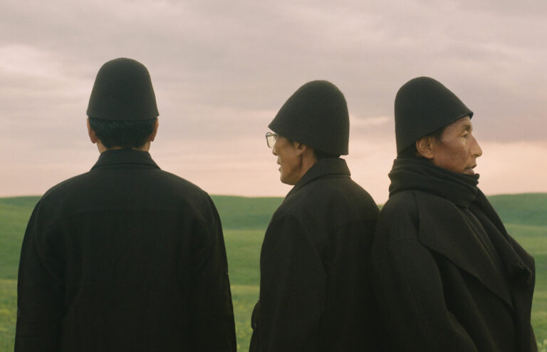 Color photo portrait of three men in Tibet by Kin Coedel