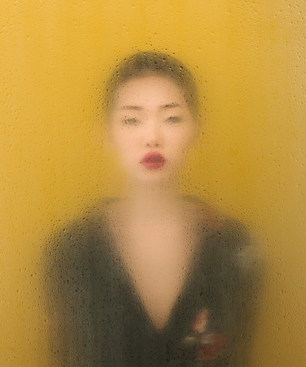 Fineart color portrait photo of a woman with red lipstick by Giuseppe Gradella