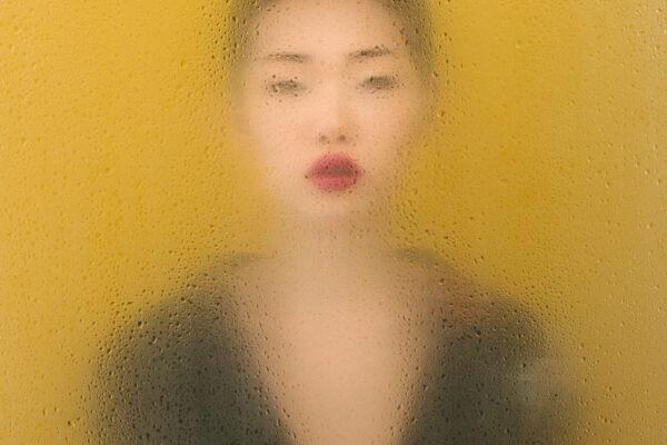 Fineart color portrait photo of a woman with red lipstick by Giuseppe Gradella