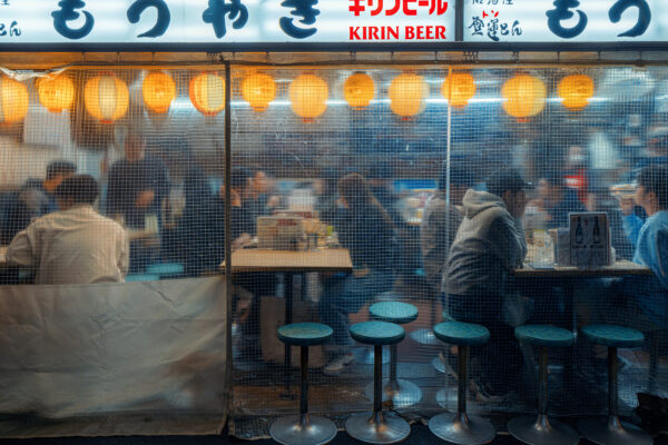 Color photo of an Izakaya under the railway embankment around Yurakucho station, Tokyo by Alessandro Zanoni