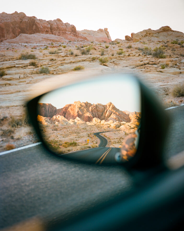 Color film photography by Jakob Lilja-Ruiz, reflection of a desert landscape in a wing mirror, USA