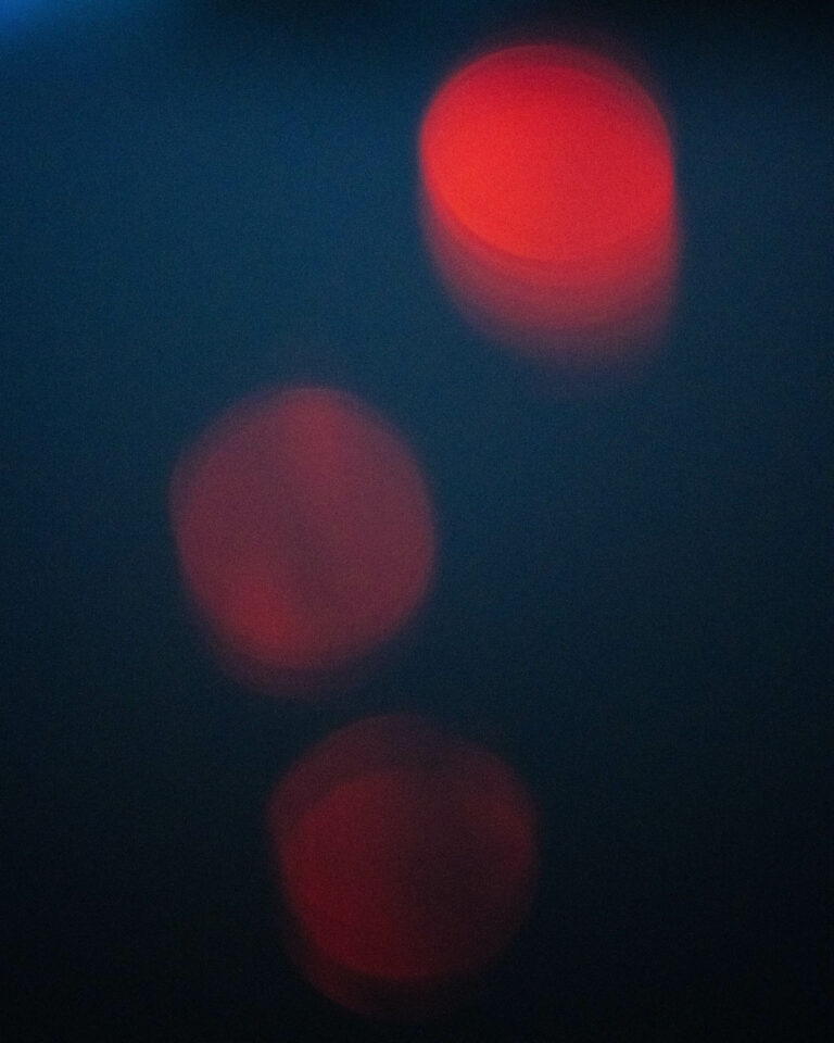 abstract color photo of red circles and sky by Joshua K. Jackson