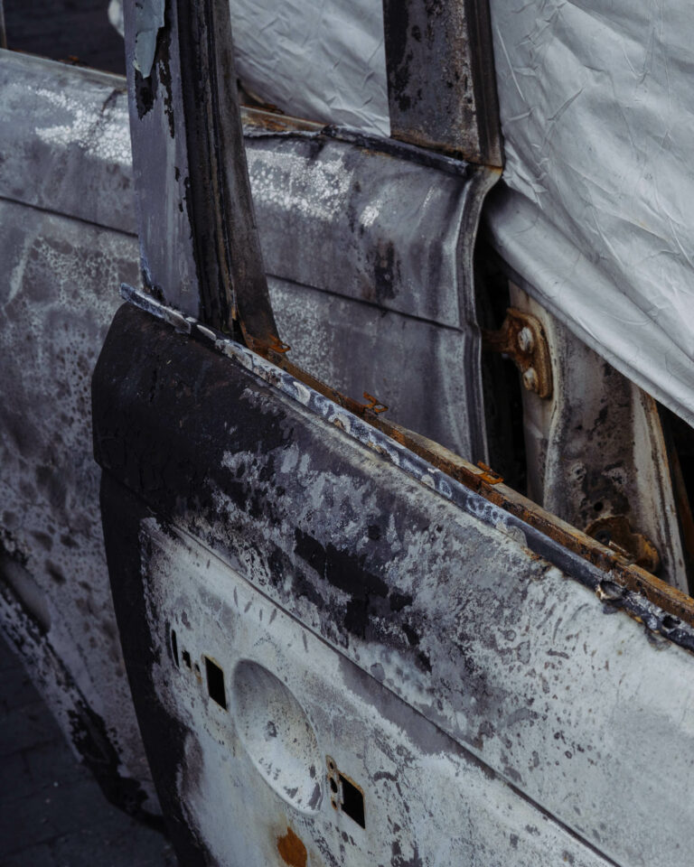 Street photography by Joshua K. Jackson. Burnt car doors.