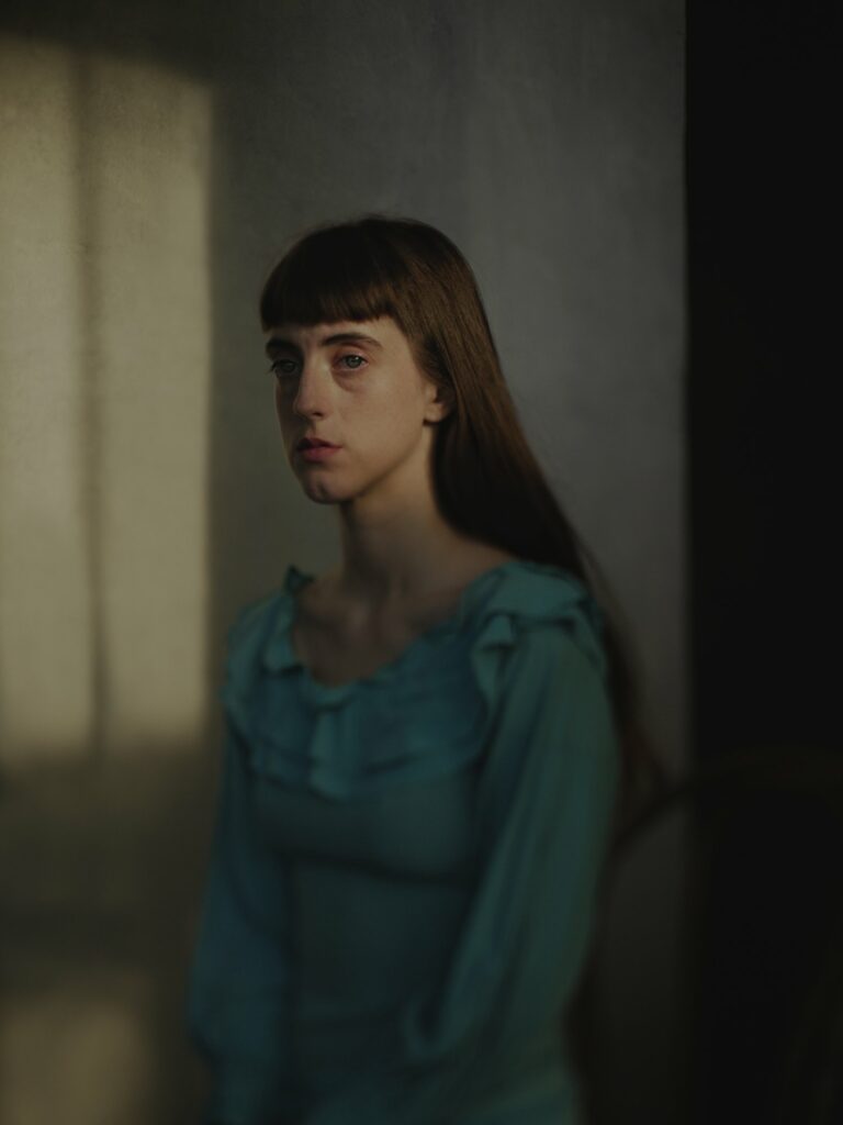 Portrait photography by Phil Sharp, young woman in blue dress