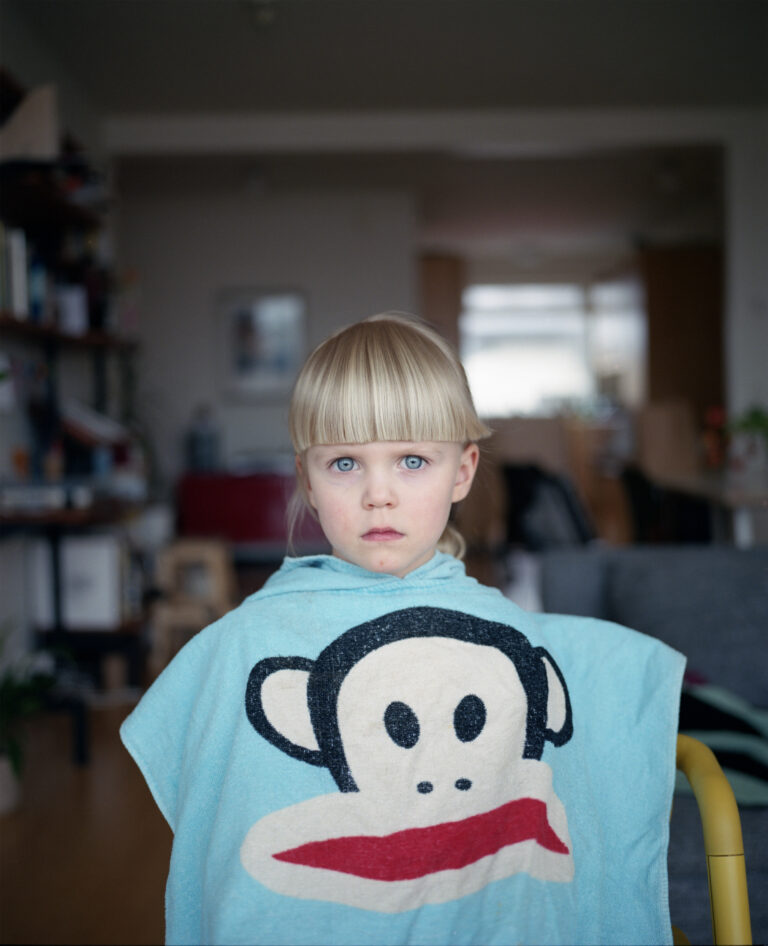 Portrait photography of a young girl who has had her haircut by Hallgerður Hallgrímsdóttir.