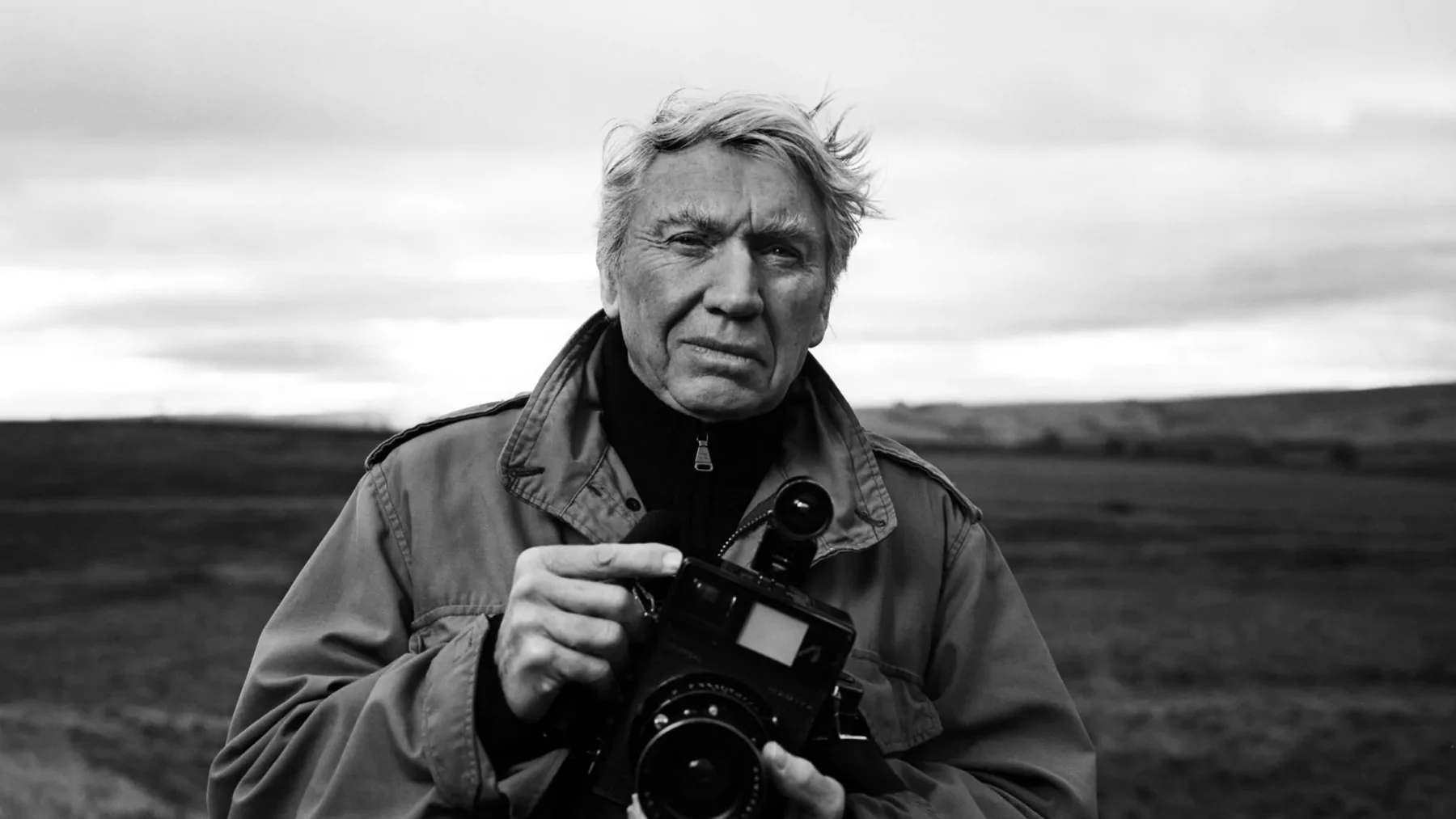 Black & white portrait photograph of photographer Don McCullin