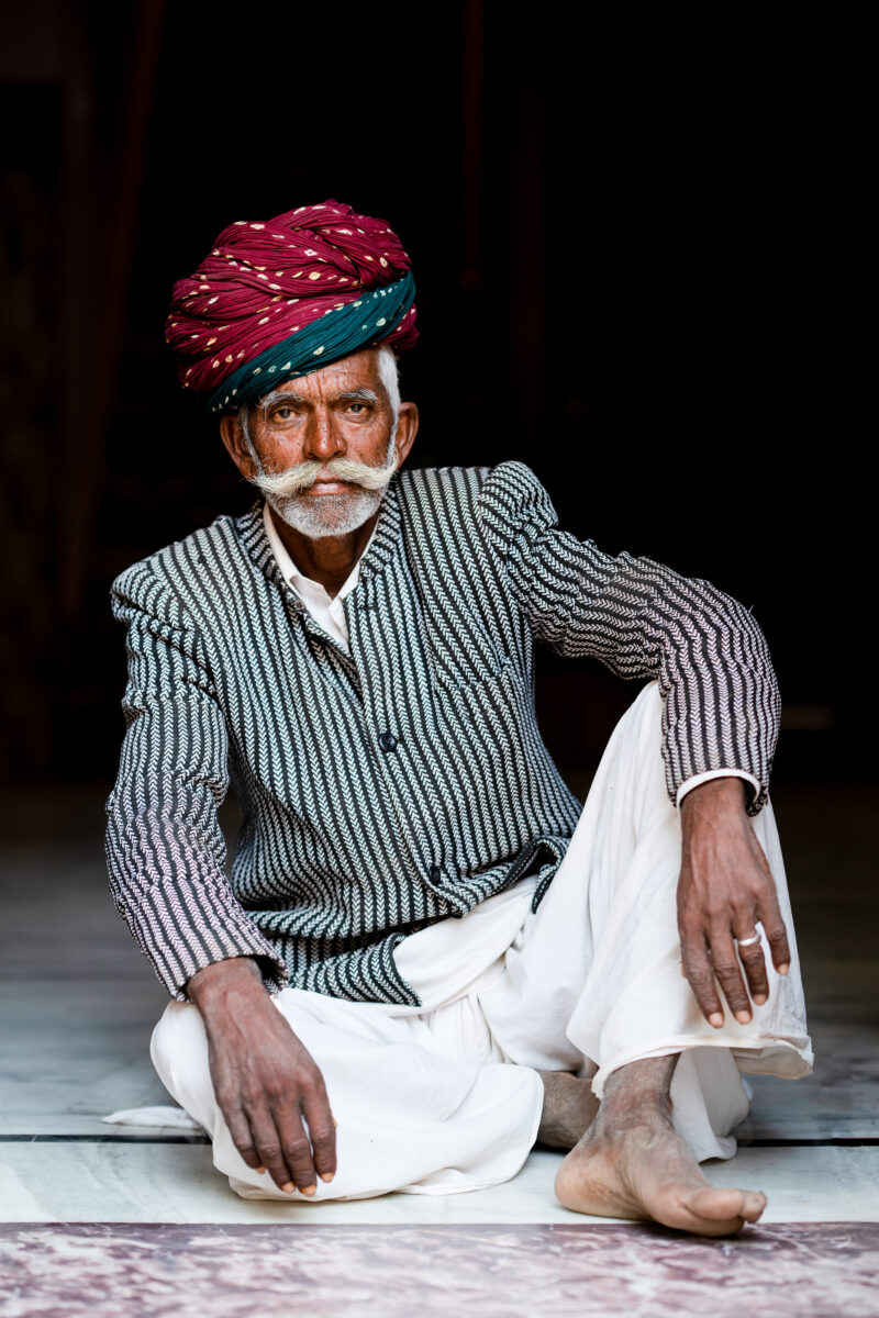 color street candid portrait of an Indian elderly man by Curtis Callaway