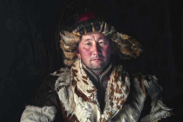 color portrait of a Mongolian Kazakh eagle hunter by Luiza Marinas