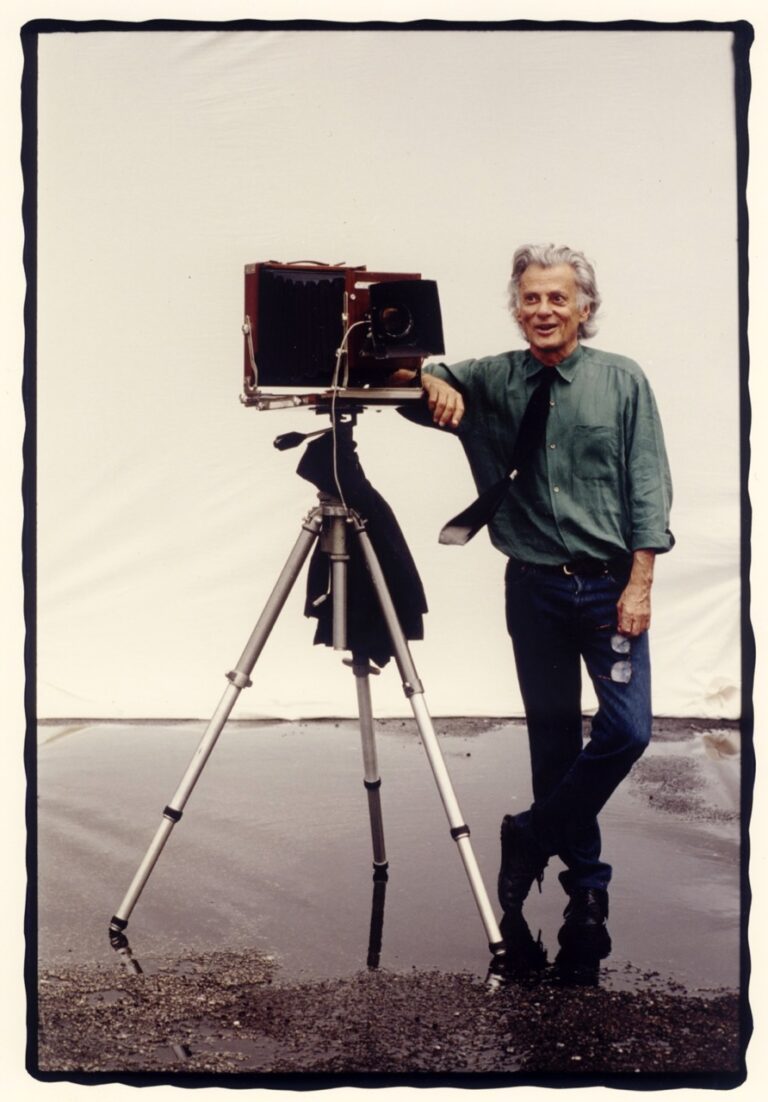 Portrait photo of Richard Avedon with his camera by Maggie Steber.