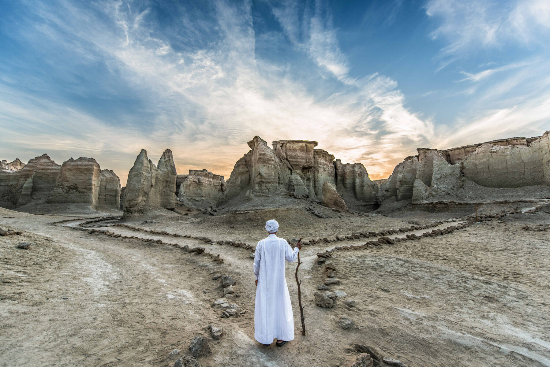 Color portrait photography of a man in landscape by Parna Baharali