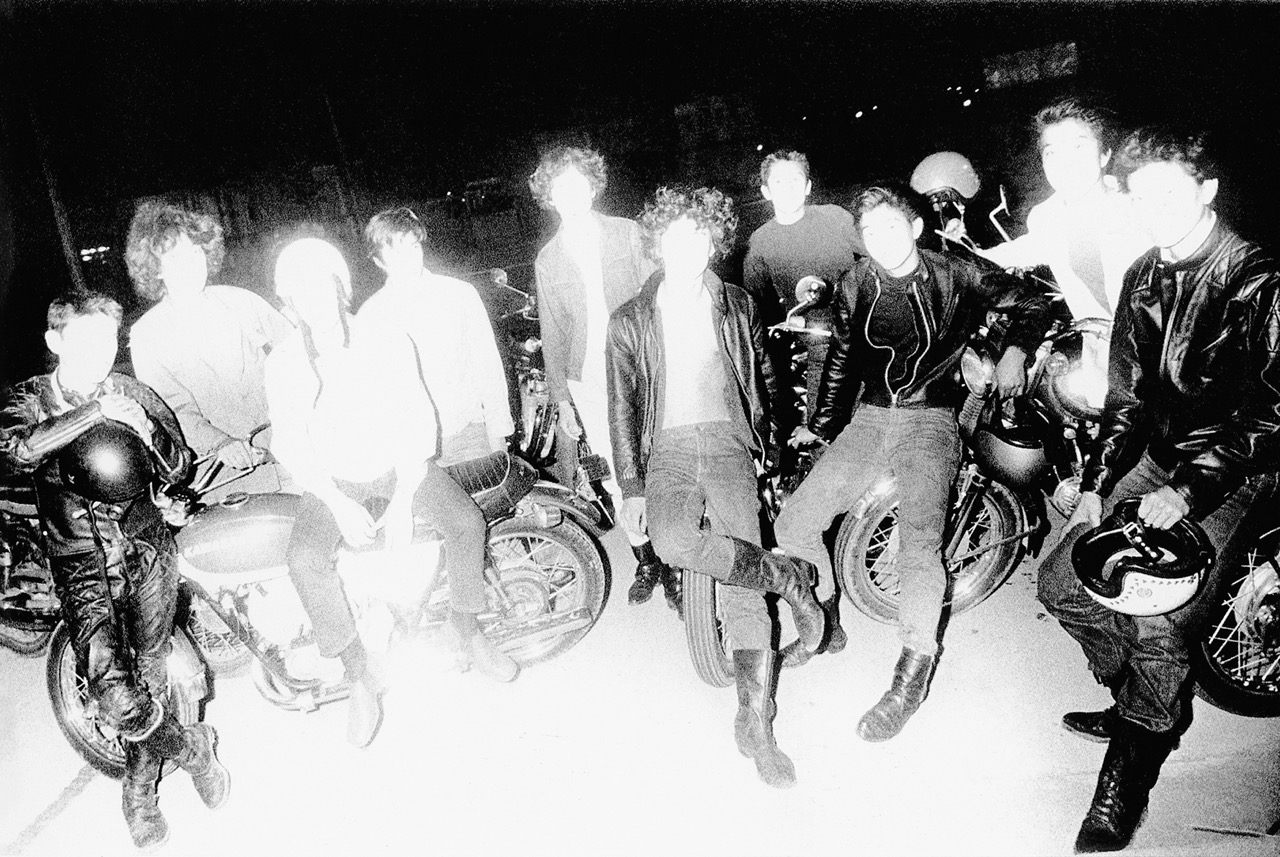 Black & white photo of a group of men by Daido Moriyama