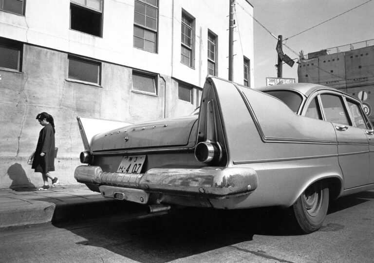 Black & white photo of a car by Daido Moriyama