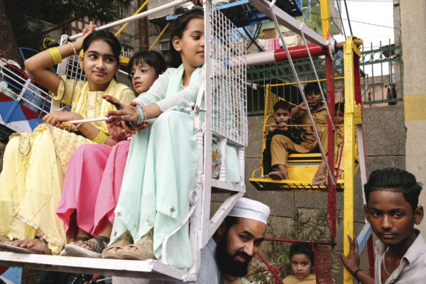 color street photo of children in playground by Sudeep Lal