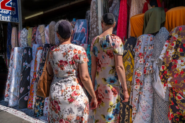 color street photo of women wearing dresses in USA by Alexandra Avlonitis