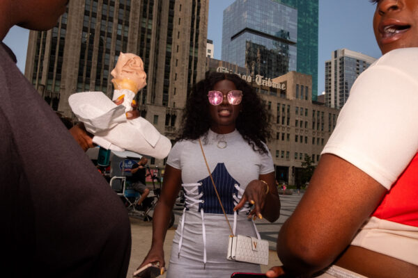 color street photo of people in New York by Bert De Busschere