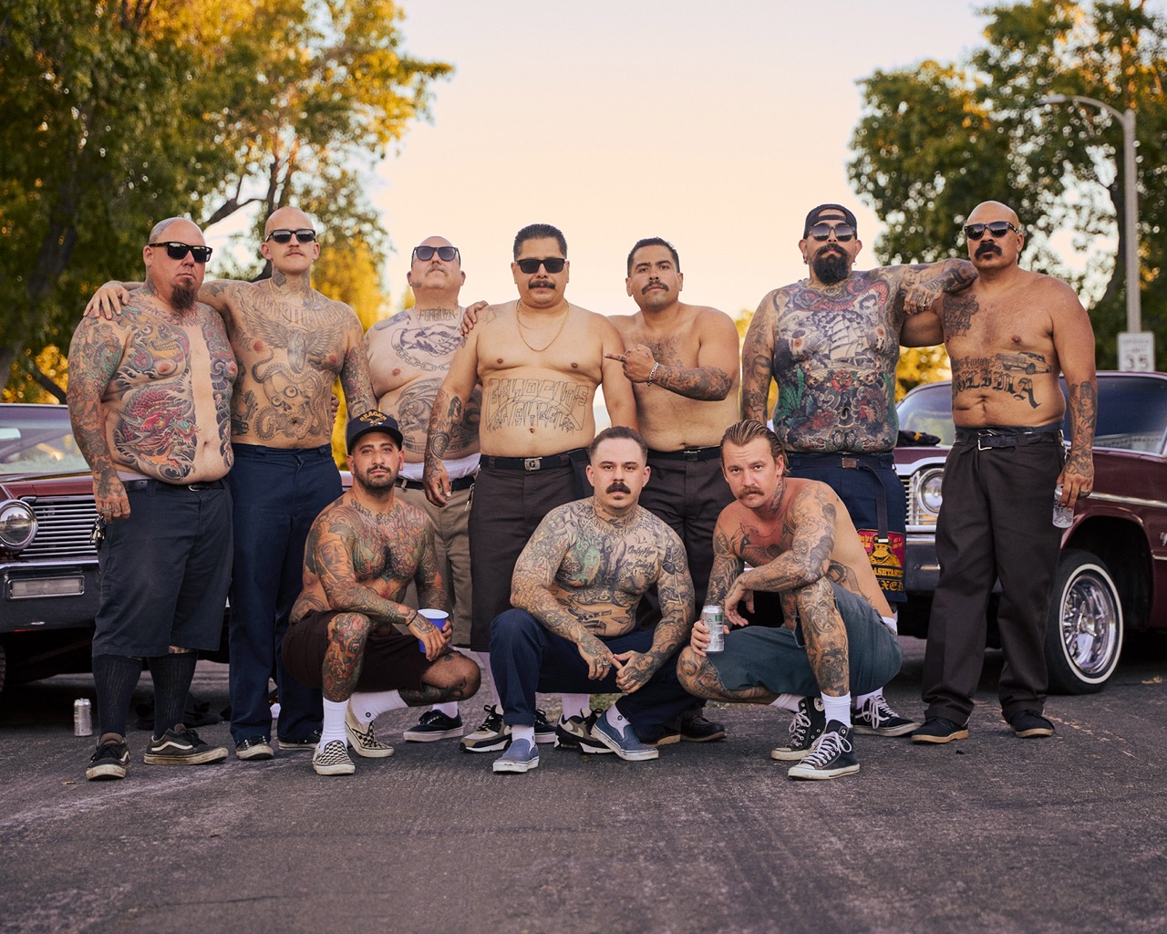 Documentary photography by Owen Harvey. Portrait of a group of lowrider group members. From the project Ground Clearance LA