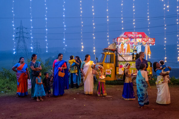 color street photo of people at fair in India by Lorenz Berna