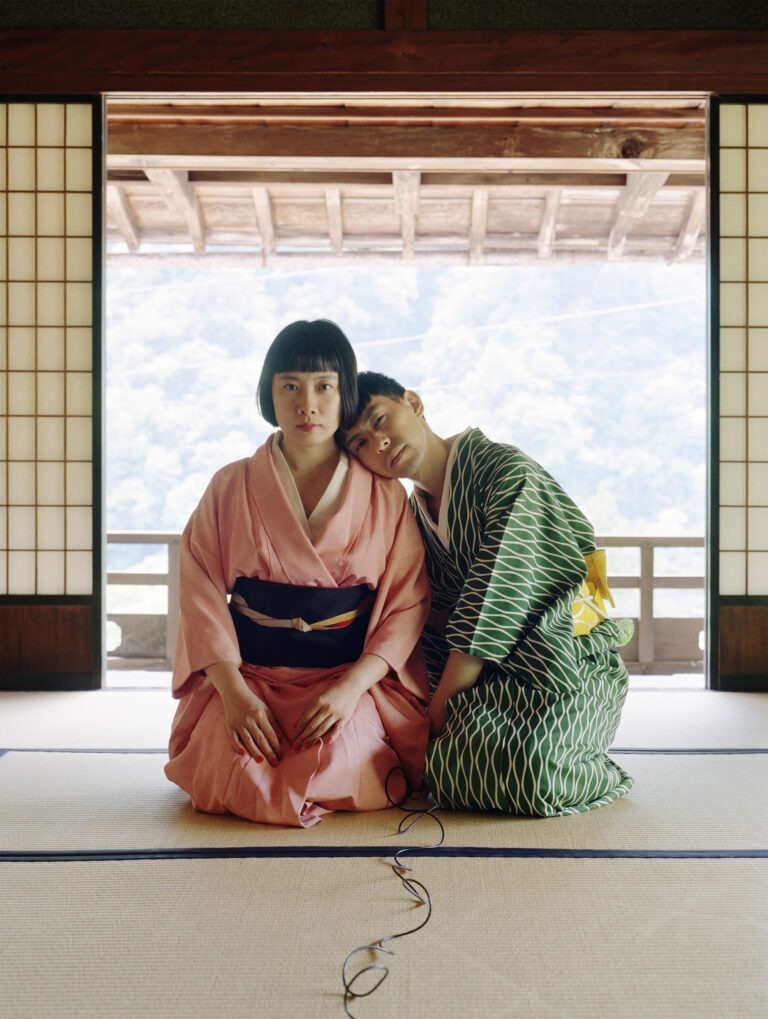 Color portrait of a woman and a man kneeling in a japanese style house by Pixy Liao