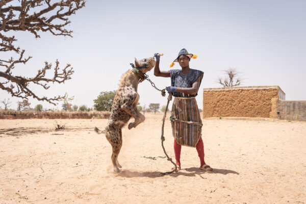 color photo of Hyena man in Nigeria by Joaquin Barata