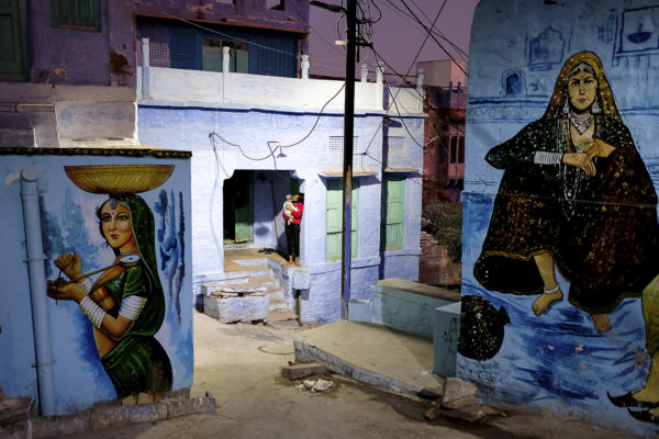 color street photo of mother and child in Jodhpur, India by Sudeep Lal