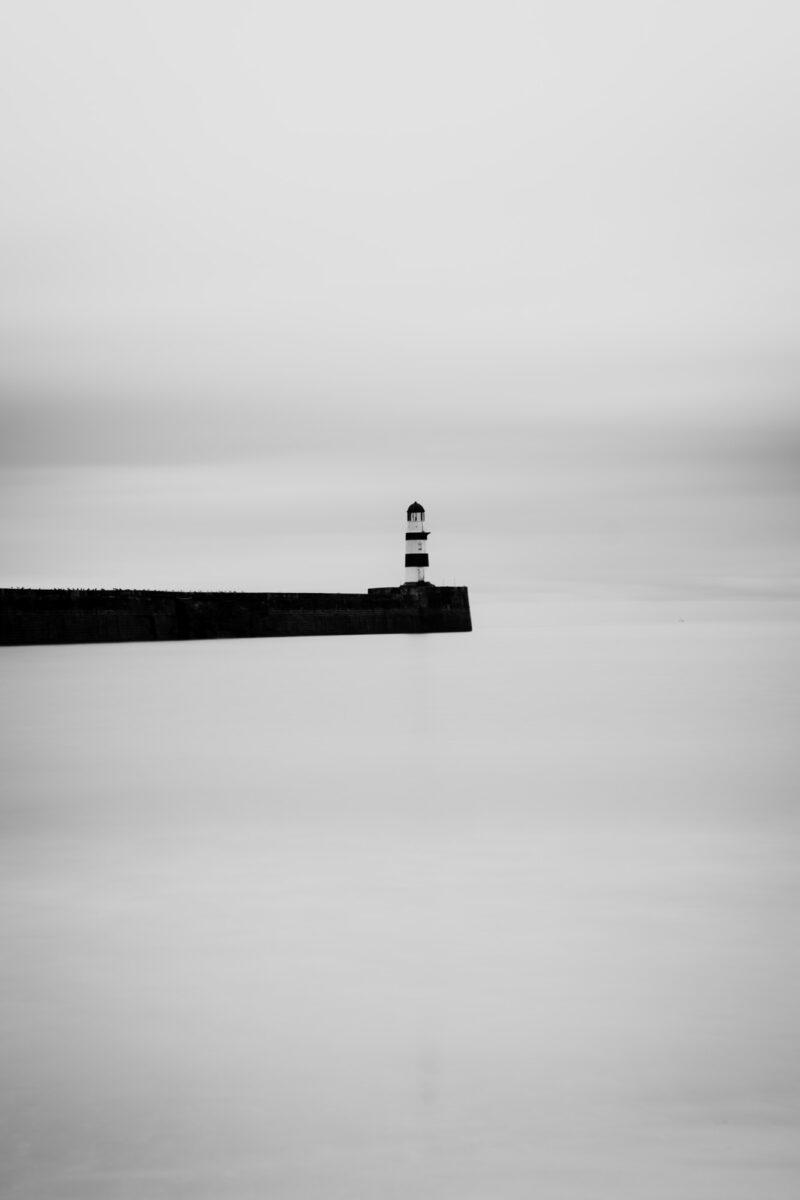 black and white landscape photo of English coast by Victoria Clarke