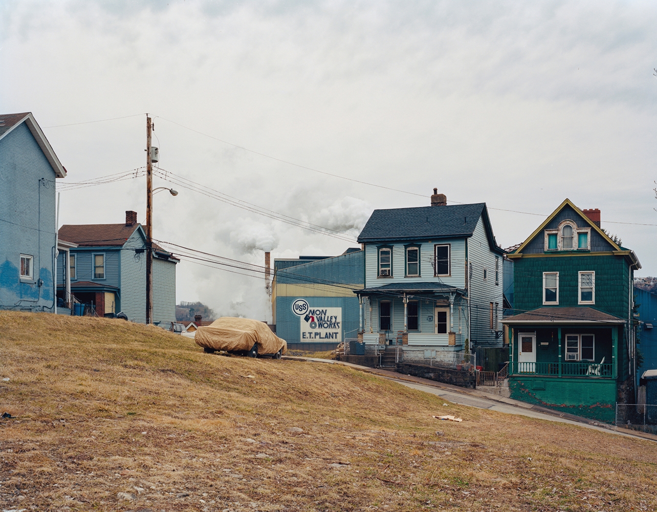 Color documentary photography by Mikel Bastida. From the book "Anarene". Green wooden houses.