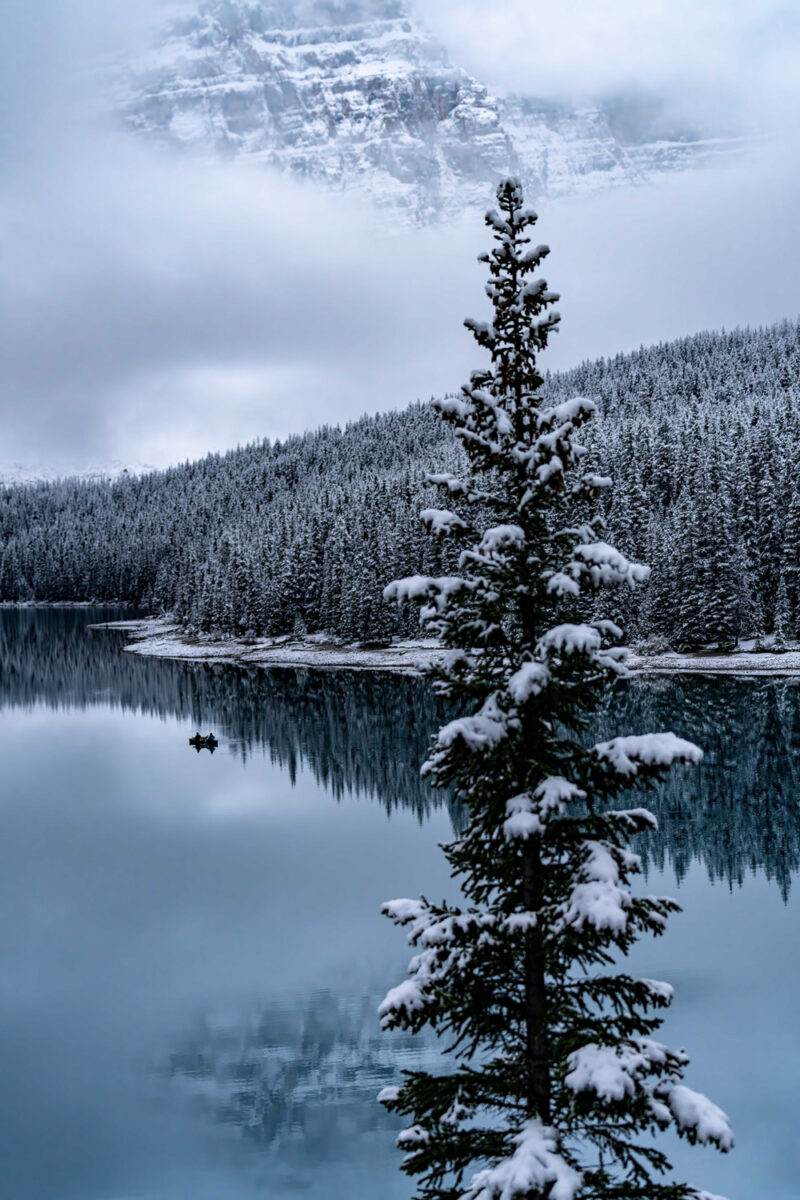 color landscape photo of snowy mountain and lake in Banff National Park, Alberta, Canada by Bob Gwaltney