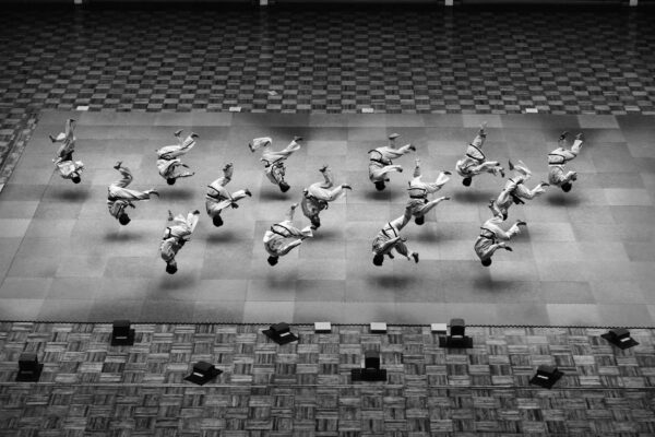 black and white photo of Taekwondo ceremony in Pyongyang, North Korea by Alain Schroeder