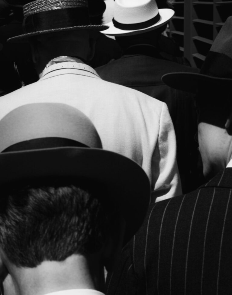 Street photography by Francesco Gioia. Black & white photo of men in hats