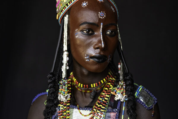 Portrait of a young Wodaabe Fula man in Chad by Stephen Hermida